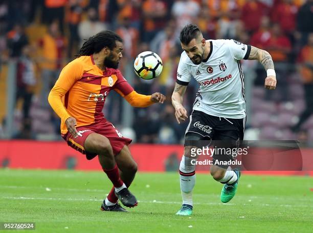 Jason Denayer of Galatasaray in action against Alvaro Negredo of Besiktas during Turkish Super Lig soccer match between Galatasaray and Besiktas at...