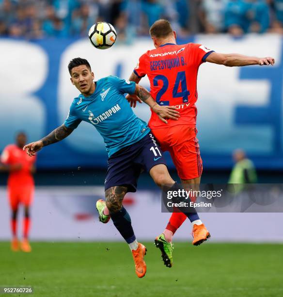 Sebastian Driussi of FC Zenit Saint Petersburg and Vasili Berezutski of PFC CSKA Moscow vie for the ball during the Russian Football League match...