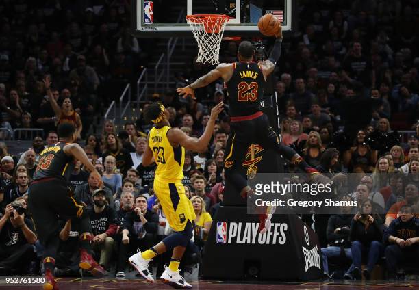 LeBron James of the Cleveland Cavaliers drives around Myles Turner of the Indiana Pacers during the first half in Game Seven of the Eastern...