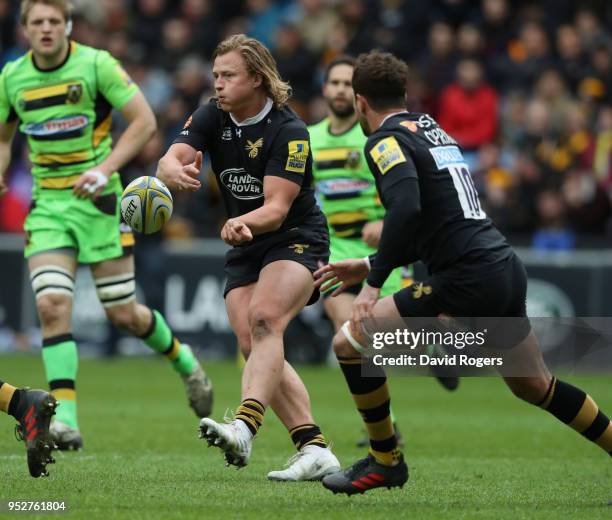 Tommy Taylor of Wasps passes the ball during the Aviva Premiership match between Wasps and Northampton Saints at The Ricoh Arena on April 29, 2018 in...