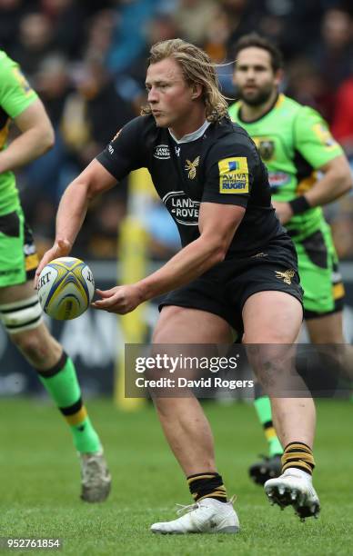 Tommy Taylor of Wasps passes the ball during the Aviva Premiership match between Wasps and Northampton Saints at The Ricoh Arena on April 29, 2018 in...