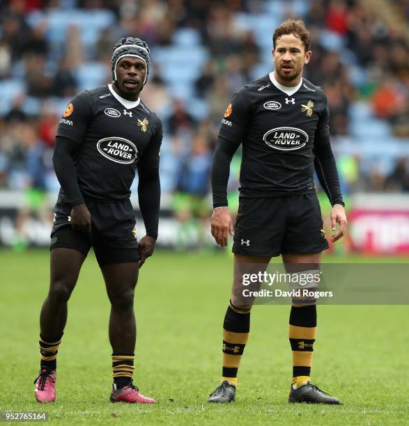 Danny Cipriani and Christian Wade of Wasps look on during the Aviva Premiership match between Wasps and Northampton Saints at The Ricoh Arena on...