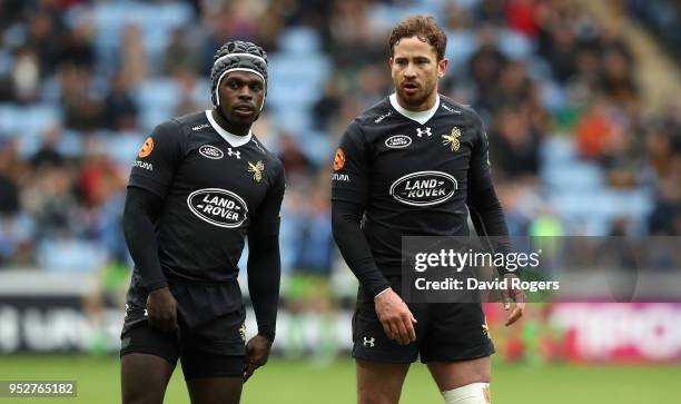 Danny Cipriani and Christian Wade of Wasps look on during the Aviva Premiership match between Wasps and Northampton Saints at The Ricoh Arena on...