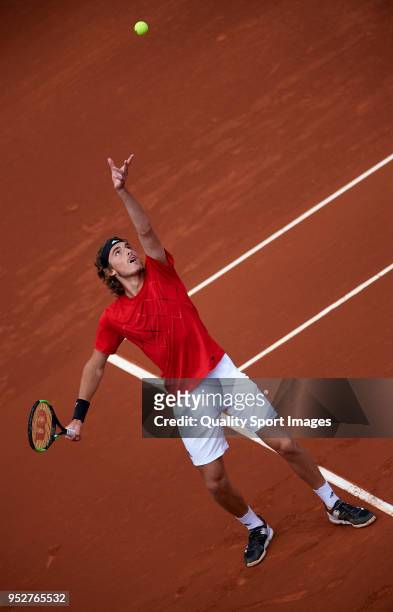 Stefanos Tsitsipas of Greece serves during his match against Rafael Nadal of Spain of Greece during day seventh of the ATP Barcelona Open Banc...