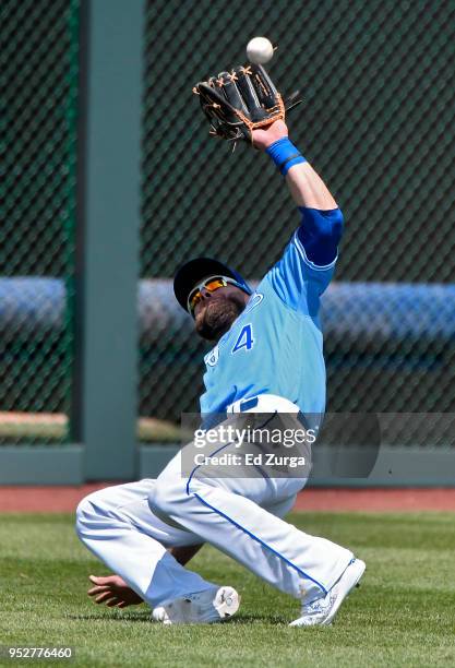 Alex Gordon of the Kansas City Royals attempts to catch a ball hit by Daniel Palka of the Chicago White Sox in the second inning at Kauffman Stadium...