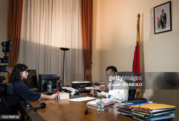 President of the Republic of Madagascar Hery Rajaonarimampianina, gestures as he answers questions from journalists during a press conference at the...