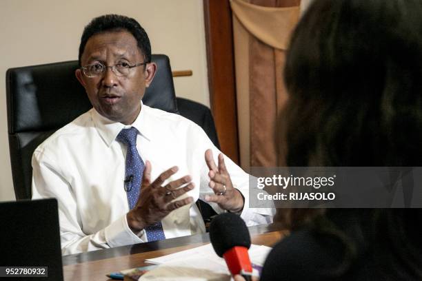 President of the Republic of Madagascar Hery Rajaonarimampianina, gestures as he answers questions from journalists during a press conference at the...