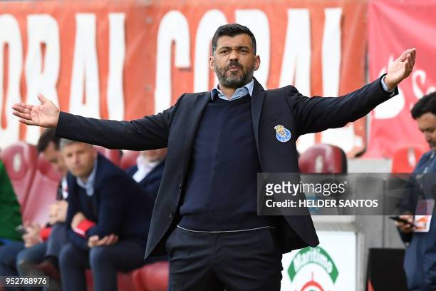 Porto's coach Sergio Conceicao reacts during the Portuguese league football match between Maritimo and Porto at the Maritimo Stadium in Funchal on...