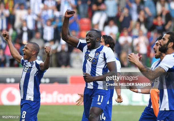 Porto's Algerian forward Yacine Brahimi and Porto's Malian forward Moussa Marega celebrate with teammates after the Portuguese league football match...