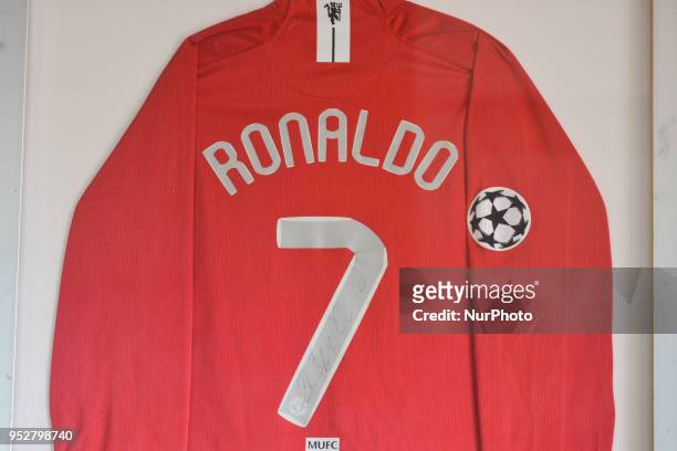 View of signed Manchester United T-shirt of Cristiano Ronaldo hanging on the wall in a frame at 'Bar Quinta Falcao' in Cristiano Ronaldo's...