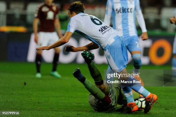 Lucas Leiva of SS Lazio compete for the ball with Salvatore Sirigu of Torino FC during the serie A match between Torino FC and SS Lazio at Stadio...