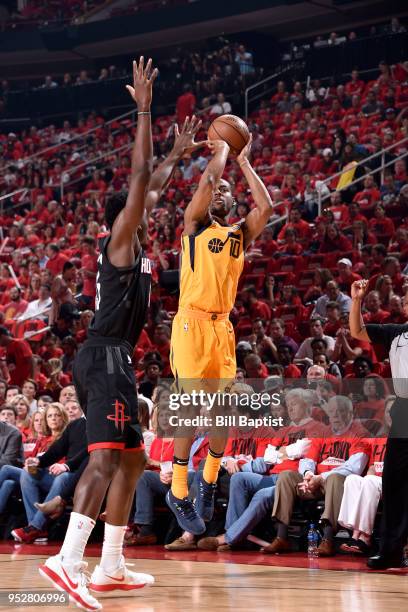 Alec Burks of the Utah Jazz shoots the ball against the Houston Rockets in Game One of the Western Conference Semifinals during the 2018 NBA Playoffs...