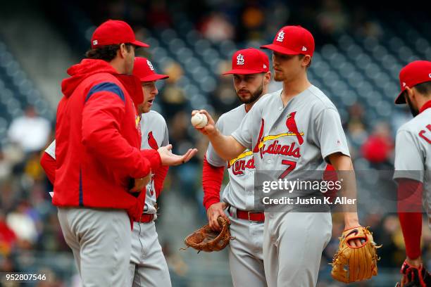 Manager Mike Matheny of the St. Louis Cardinals relieves Luke Weaver in the sixth inning against the Pittsburgh Pirates at PNC Park on April 29, 2018...