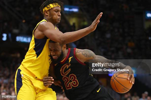LeBron James of the Cleveland Cavaliers tries to drive around Myles Turner of the Indiana Pacers during the second half in Game Seven of the Eastern...