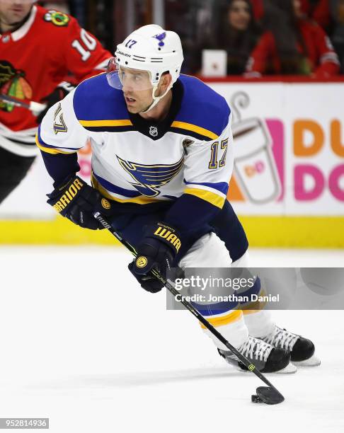 Jaden Schwartz of the St. Louis Blues turns with the puck against the Chicago Blackhawks at the United Center on March 18, 2018 in Chicago, Illinois.