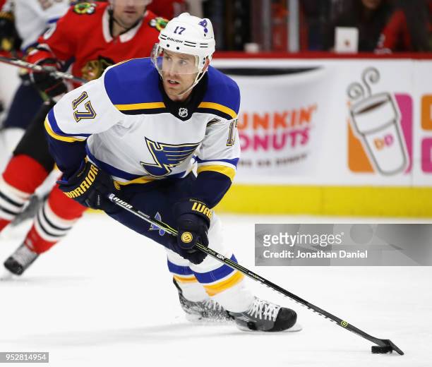 Jaden Schwartz of the St. Louis Blues turns with the puck against the Chicago Blackhawks at the United Center on March 18, 2018 in Chicago, Illinois.