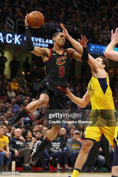 Jordan Clarkson of the Cleveland Cavaliers looks to pass around Bojan Bogdanovic of the Indiana Pacers during the second half in Game Seven of the...