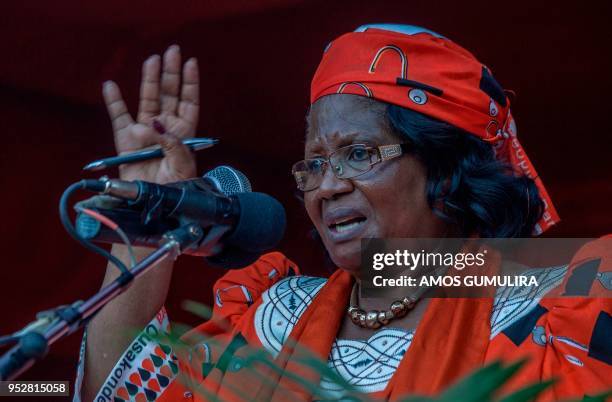 Malawi's former president Joyce Banda attends a rally for the People's Party at her home village, at Domasi in Zomba, eastern Malawi, on April 29,...