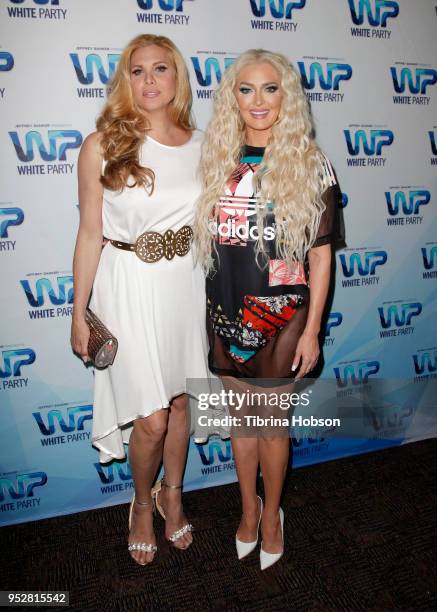 Candis Cayne and Erika Jayne attend Jeffrey Sanker's 2018 White Party on April 28, 2018 in Palm Springs, California.