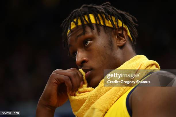 Myles Turner of the Indiana Pacers looks on from the bench late in the fourth quarter while playing the Cleveland Cavaliers in Game Seven of the...