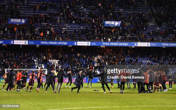 Barcelona players and coaching staff celebrate winning the title after the La Liga match between Deportivo La Coruna and Barcelona at Estadio Riazor...