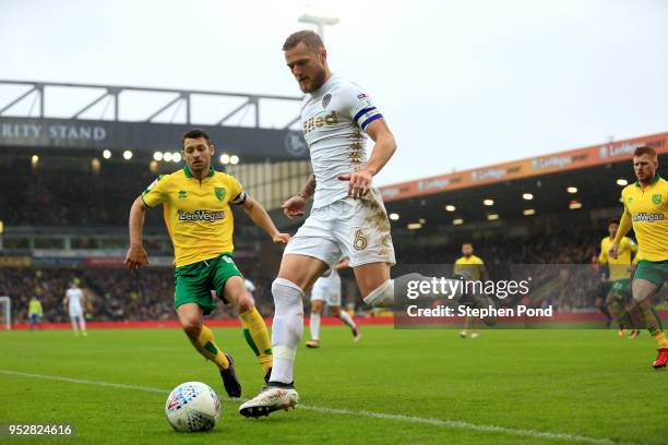 Wes Hoolahan of Norwich City and Liam Cooper of Leeds United compete for the ball during the Sky Bet Championship match between Norwich City and...