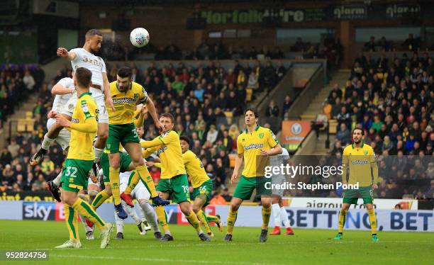 Kemar Roofe of Leeds United heads a shot at goal during the Sky Bet Championship match between Norwich City and Leeds United at Carrow Road on April...