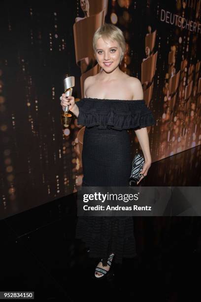 Jella Haase poses with her award after the Lola - German Film Award show at Messe Berlin on April 27, 2018 in Berlin, Germany.