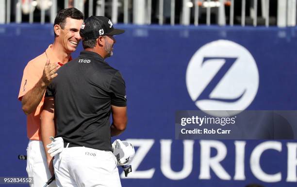 Billy Horschel reacts with teammate Scott Piercy on the 18th hole during the final round of the Zurich Classic at TPC Louisiana on April 29, 2018 in...