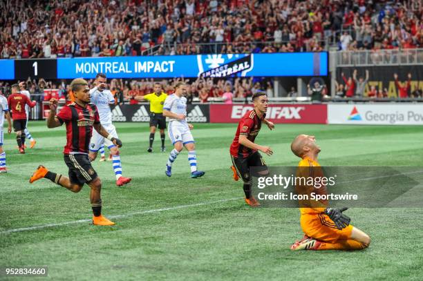 Evan Bush of Montreal Impact is not happy with giving up a Miguel Almiron of Atlanta United goal of a penalty kick during an MLS regular season game...