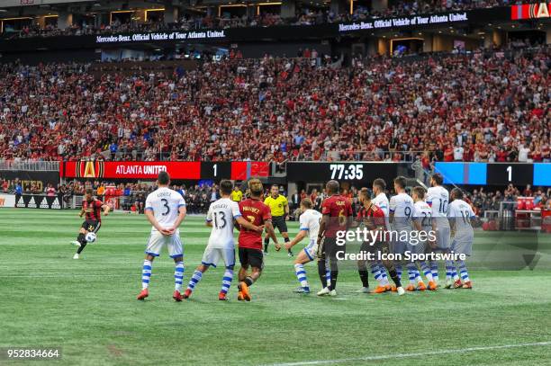 Kevin Kratz of Atlanta United strikes scores on a free kick during an MLS regular season game between the Montreal Impact and Atlanta United at...