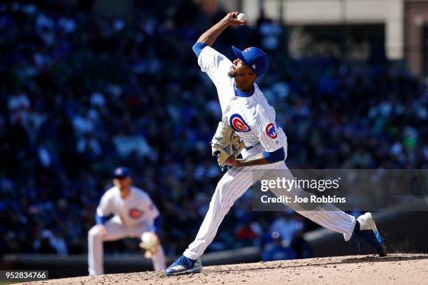 Carl Edwards Jr. #6 of the Chicago Cubs pitches in the eighth inning of a game against the Milwaukee Brewers at Wrigley Field on April 29, 2018 in...