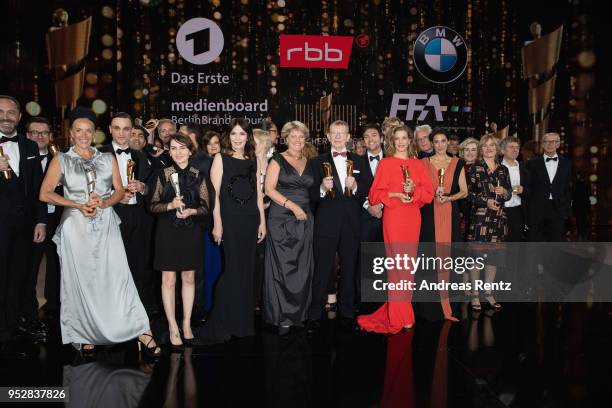 All the Award winners with Birgit Minichmayer, Hark Bohm, Marie Baeumer and Emily Atef pose on stage during the Lola - German Film Award show at...