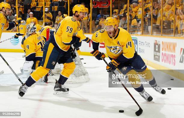 Mattias Ekholm and Roman Josi of the Nashville Predators skate in warm-ups prior to the game against in Game Two of the Western Conference Second...
