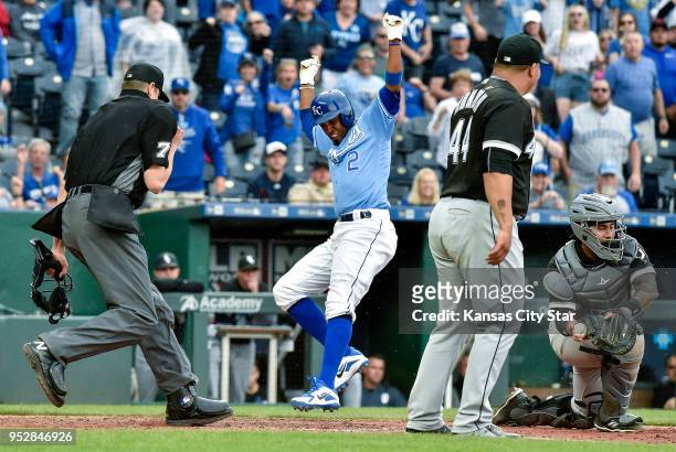 Kansas City Royals' Alcides Escobar scores in the eighth inning behind Chicago White Sox catcher Omar Narvaez and relief pitcher Bruce Rondon on a...