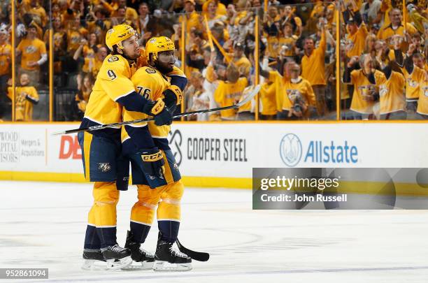 Filip Forsberg embraces P.K. Subban of the Nashville Predators after a goal against the Winnipeg Jets in Game Two of the Western Conference Second...