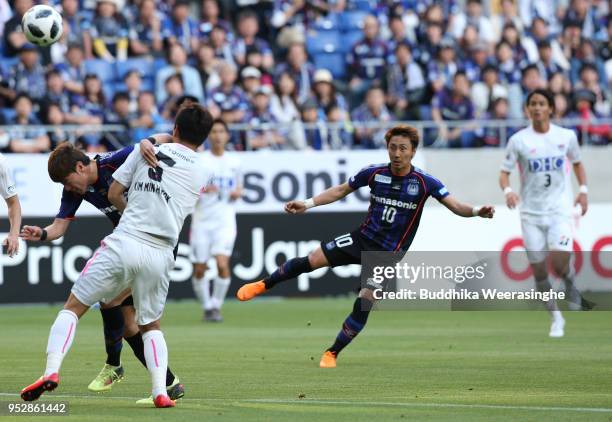 Shu Kurata of Gamba Osaka scores the opening goal during the J.League J1 match between Gamba Osaka and Sagan Tosu at Suita City Football Stadium on...