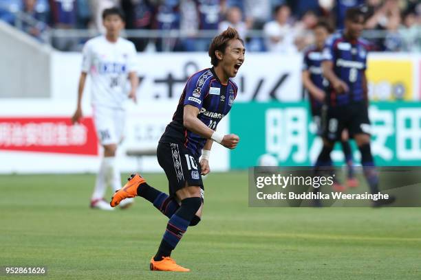 Shu Kurata of Gamba Osaka celebrates scoring the opening goal during the J.League J1 match between Gamba Osaka and Sagan Tosu at Suita City Football...