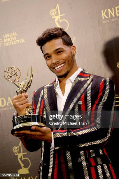 Rome Flynn, winner of Outstanding Younger Actor in a Drama Series for 'The Bold and the Beautiful', poses in the press room during the 45th annual...