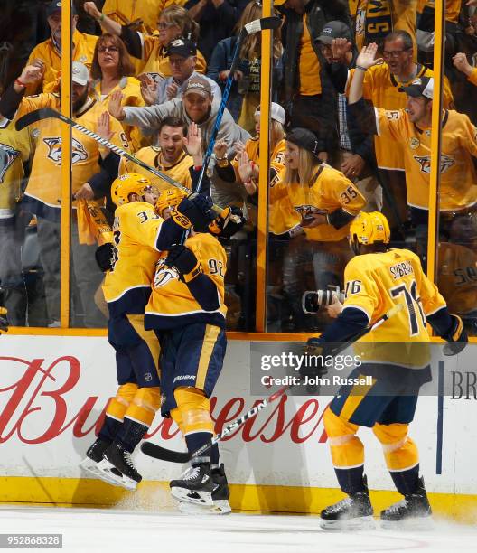 Ryan Johansen celebrates his goal with Viktor Arvidsson and P.K. Subban of the Nashville Predators against the Winnipeg Jets in Game Two of the...