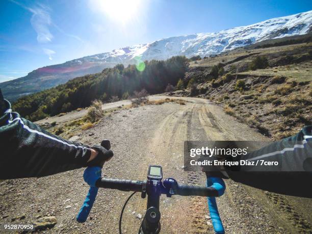 personal perspective of a cyclist on a trail in sierra nevada natural park, near trevélez (spain) - elektro fahrrad stock-fotos und bilder