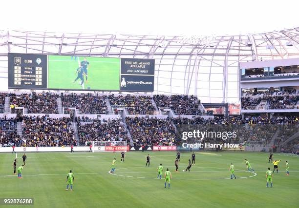 Carlos Vela makes the first touch in the inaugural home game against the Seattle Sounders at Banc of California Stadium on April 29, 2018 in Los...