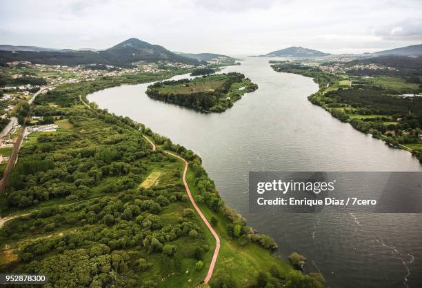 aerial view of the last kilometres of the minho river - minho portugal stockfoto's en -beelden