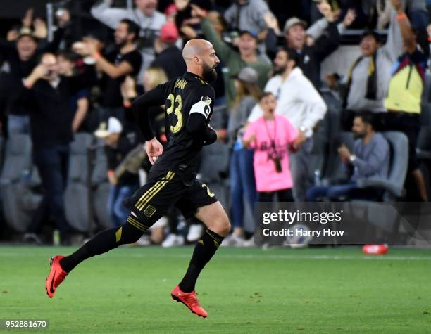 Laurent Ciman of Los Angeles FC celebrates his goal to take a 1-0 lead over the Seattle Sounders in extra time during the inaugural home game at Banc...