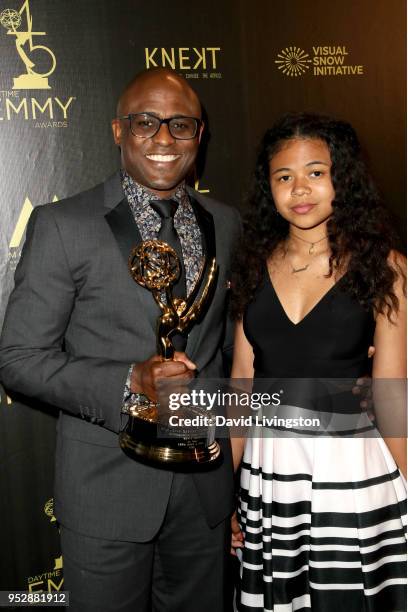 Wayne Brady, winner of Outstanding Game Show Host for 'Let's Make a Deal', poses in the press room during the 45th annual Daytime Emmy Awards at...