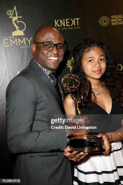 Wayne Brady, winner of Outstanding Game Show Host for 'Let's Make a Deal', poses in the press room during the 45th annual Daytime Emmy Awards at...