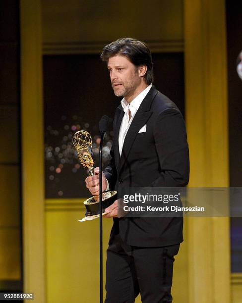 Greg Vaughan, winner of Outstanding Supporting Actor in a Drama Series for 'Days of Our Lives', accepts award onstage during the 45th annual Daytime...