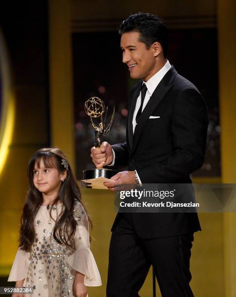 Co-host Mario Lopez and Gia Francesca Lopez speak onstage during the 45th annual Daytime Emmy Awards at Pasadena Civic Auditorium on April 29, 2018...