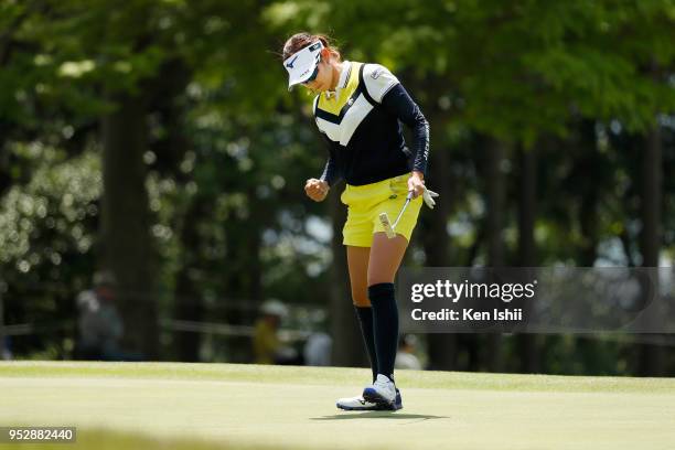 Erika Hara of Japan reacts after making a birdie on the 15th green the final round of the CyberAgent Ladies Golf Tournament at Grand fields Country...