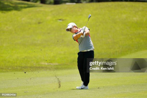 Hee-Kyung Bae of Korea hits an approach on the 15th hole during the final round of the CyberAgent Ladies Golf Tournament at Grand fields Country Club...